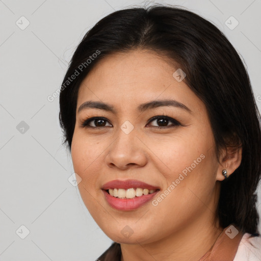 Joyful asian young-adult female with medium  brown hair and brown eyes