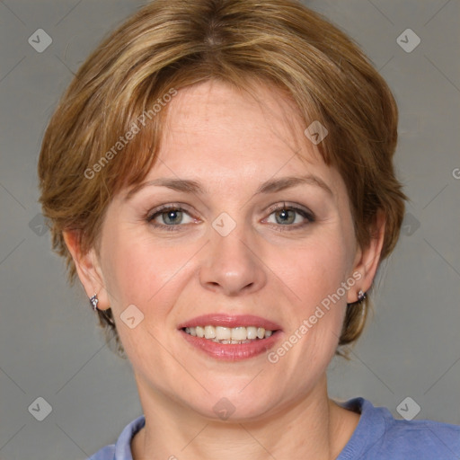 Joyful white adult female with medium  brown hair and blue eyes