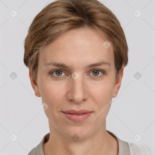 Joyful white young-adult female with short  brown hair and grey eyes