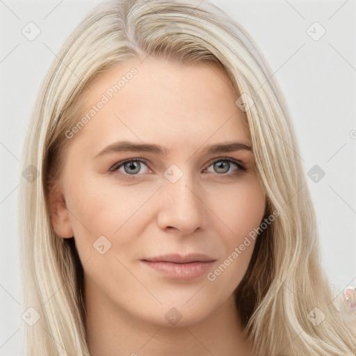 Joyful white young-adult female with long  brown hair and blue eyes