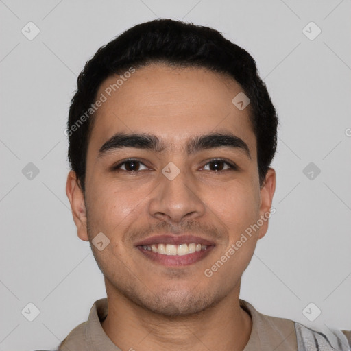 Joyful latino young-adult male with short  black hair and brown eyes