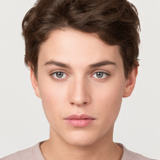 Neutral white young-adult female with short  brown hair and brown eyes