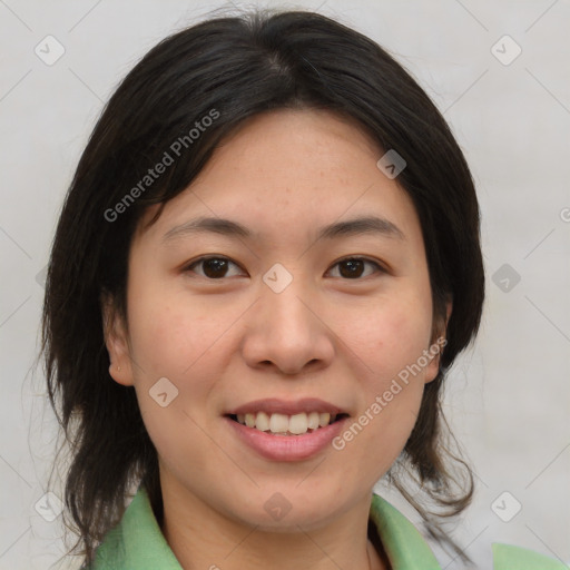 Joyful asian young-adult female with medium  brown hair and brown eyes