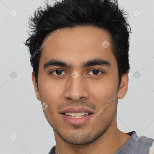 Joyful latino young-adult male with short  black hair and brown eyes