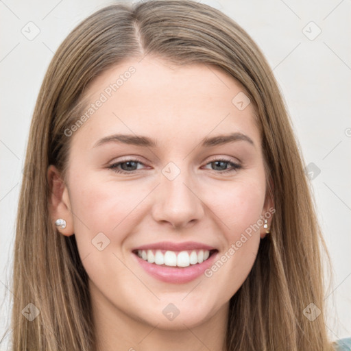 Joyful white young-adult female with long  brown hair and grey eyes