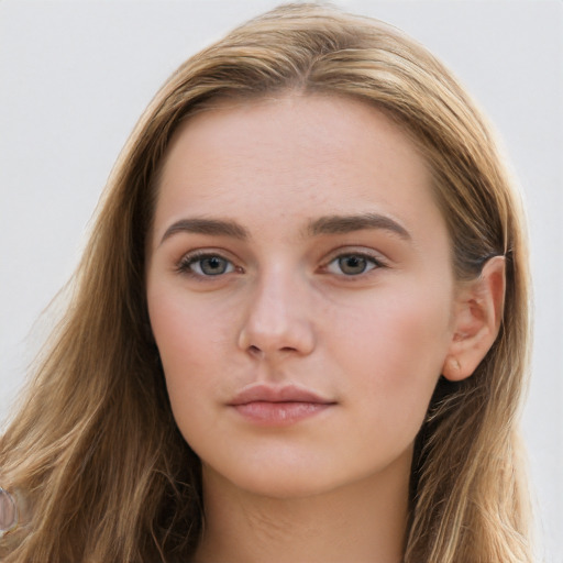 Neutral white young-adult female with long  brown hair and brown eyes