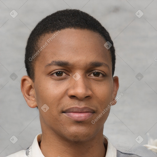 Joyful black young-adult male with short  brown hair and brown eyes