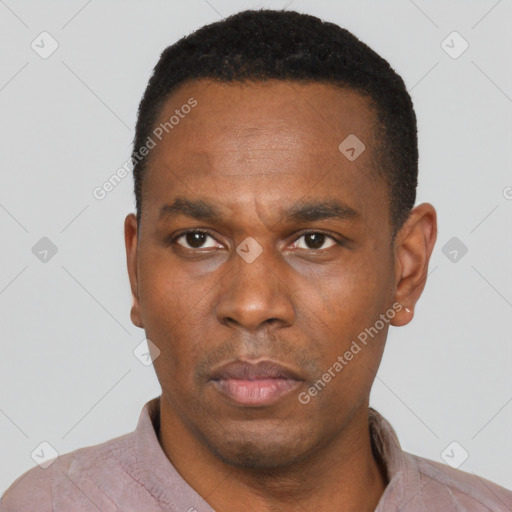 Neutral black adult male with short  black hair and brown eyes