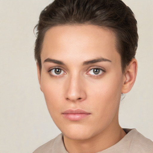 Neutral white young-adult female with short  brown hair and brown eyes