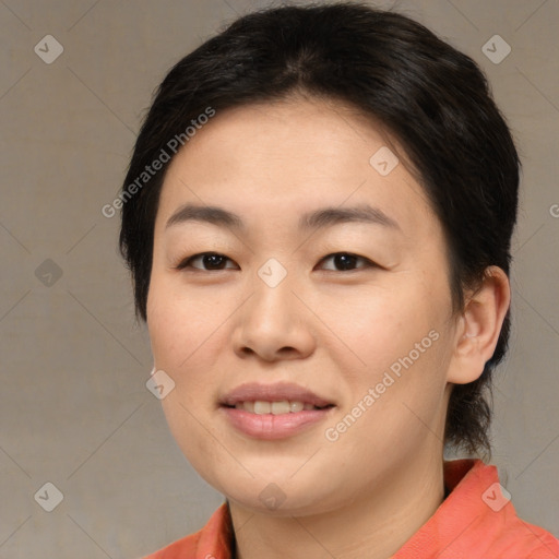 Joyful asian young-adult female with medium  brown hair and brown eyes