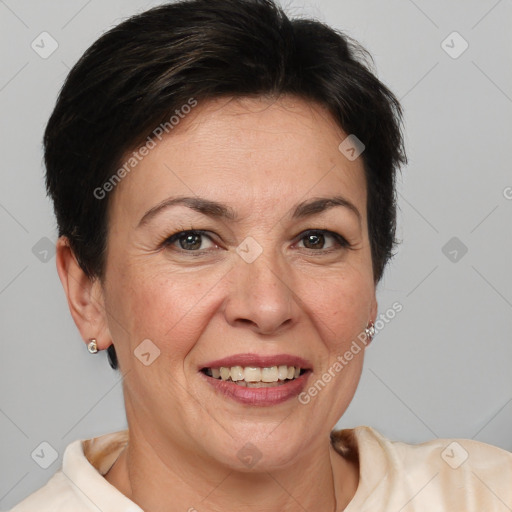 Joyful white adult female with short  brown hair and brown eyes