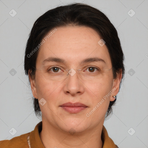 Joyful white adult female with medium  brown hair and brown eyes