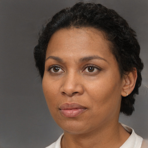 Neutral black adult female with short  brown hair and brown eyes