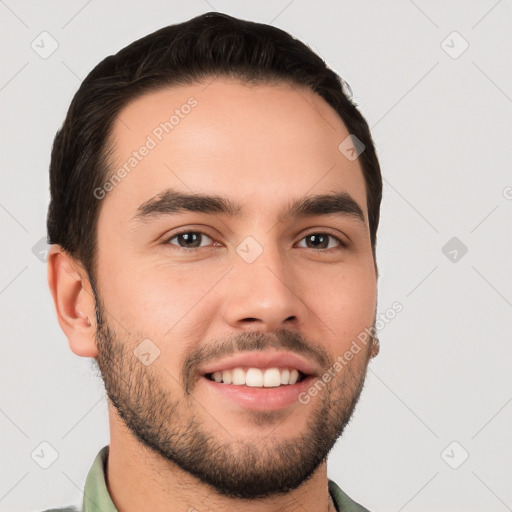 Joyful white young-adult male with short  black hair and brown eyes