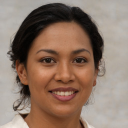 Joyful asian young-adult female with medium  brown hair and brown eyes