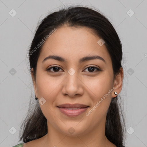 Joyful latino young-adult female with medium  brown hair and brown eyes