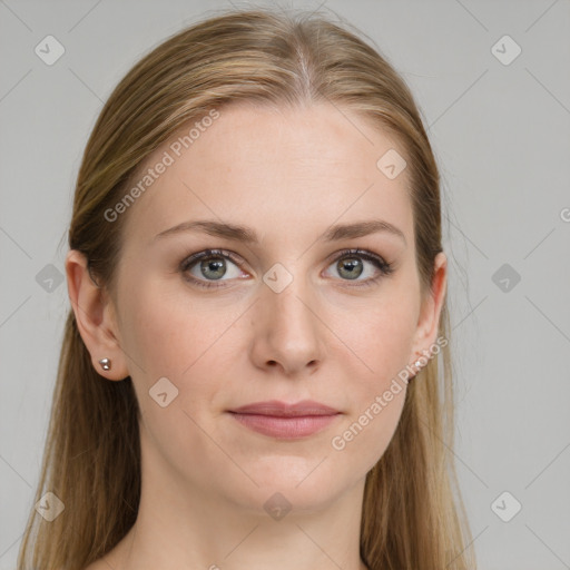 Joyful white young-adult female with long  brown hair and blue eyes