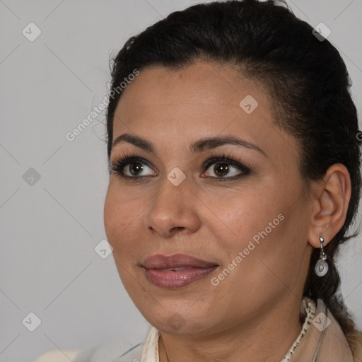 Joyful latino young-adult female with short  brown hair and brown eyes