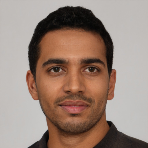 Neutral latino young-adult male with short  black hair and brown eyes