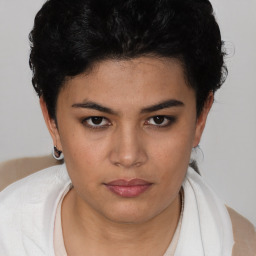 Neutral white young-adult female with short  black hair and brown eyes