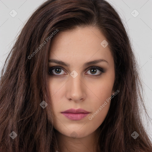 Neutral white young-adult female with long  brown hair and brown eyes