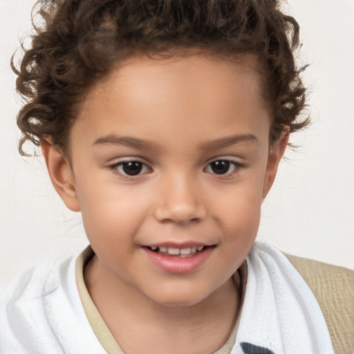 Joyful white child female with short  brown hair and brown eyes