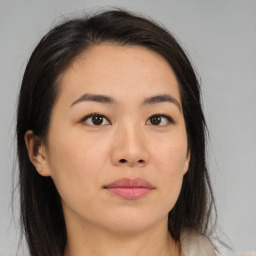 Neutral asian young-adult female with medium  brown hair and brown eyes