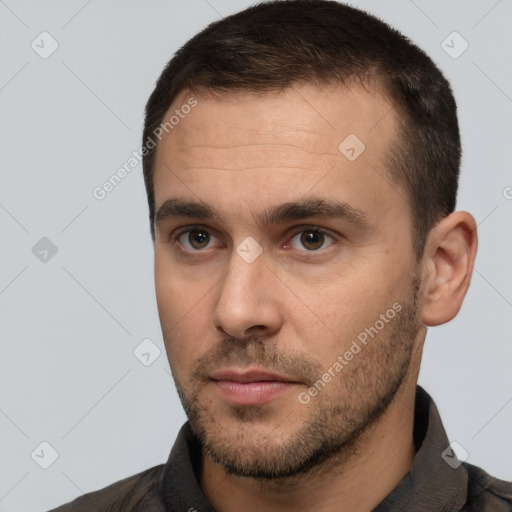 Neutral white young-adult male with short  brown hair and brown eyes