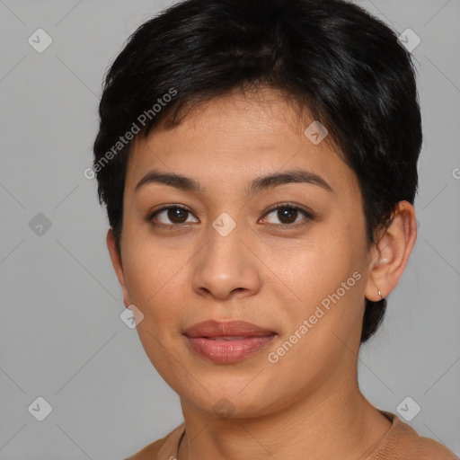 Joyful asian young-adult female with short  brown hair and brown eyes