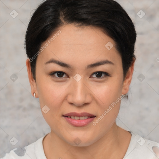 Joyful asian young-adult female with short  brown hair and brown eyes