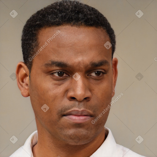 Neutral latino young-adult male with short  brown hair and brown eyes
