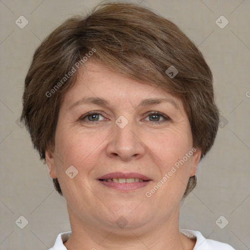 Joyful white adult female with short  brown hair and brown eyes