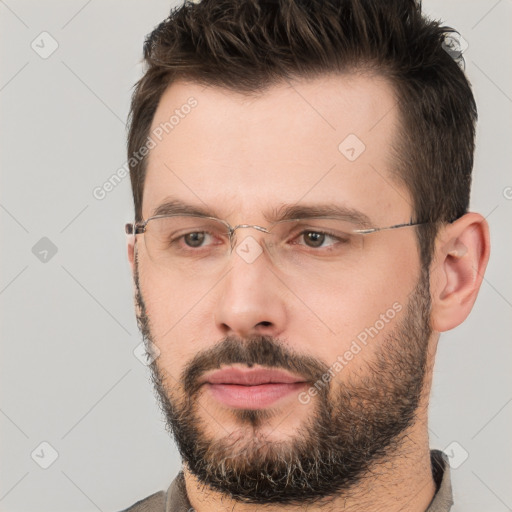 Neutral white young-adult male with short  brown hair and brown eyes