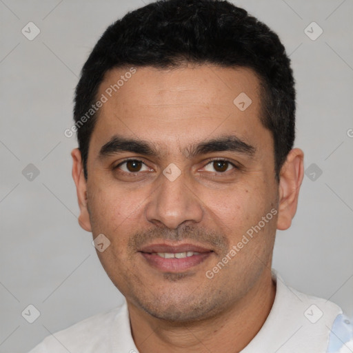 Joyful white young-adult male with short  black hair and brown eyes