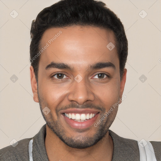 Joyful latino young-adult male with short  black hair and brown eyes