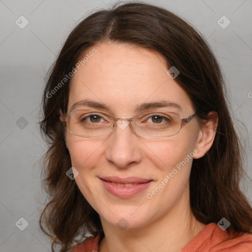 Joyful white adult female with medium  brown hair and grey eyes