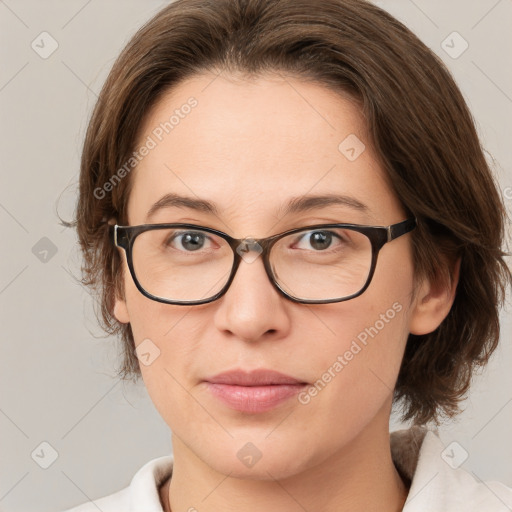 Joyful white young-adult female with medium  brown hair and green eyes