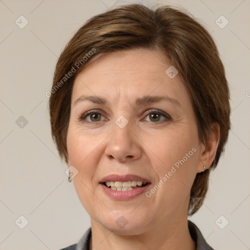 Joyful white adult female with medium  brown hair and grey eyes