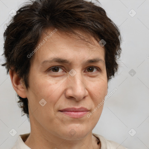 Joyful white adult female with short  brown hair and brown eyes