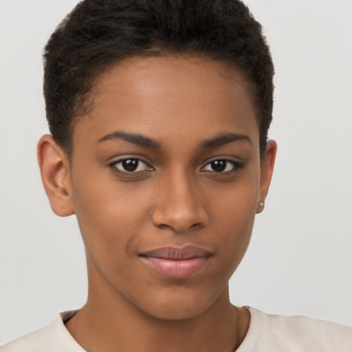 Joyful black young-adult female with short  brown hair and brown eyes