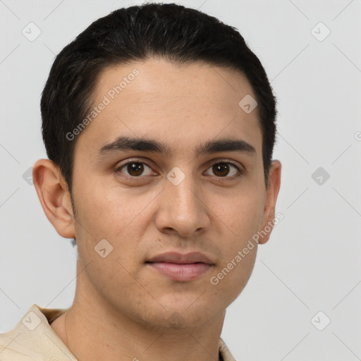 Joyful white young-adult male with short  brown hair and brown eyes