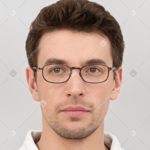 Neutral white young-adult male with short  brown hair and grey eyes