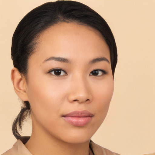 Joyful latino young-adult female with medium  black hair and brown eyes