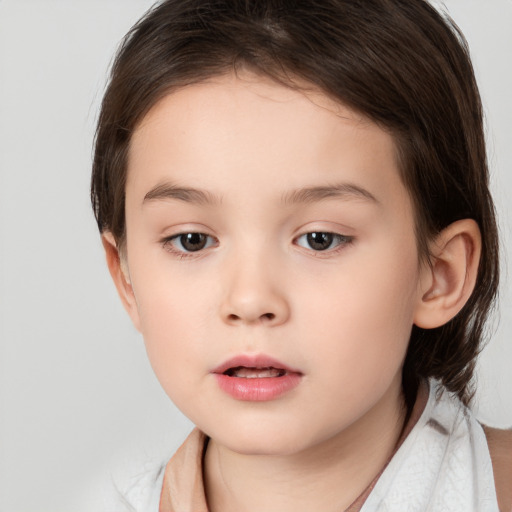 Neutral white child female with medium  brown hair and brown eyes