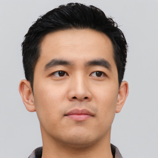 Neutral asian young-adult male with short  black hair and brown eyes