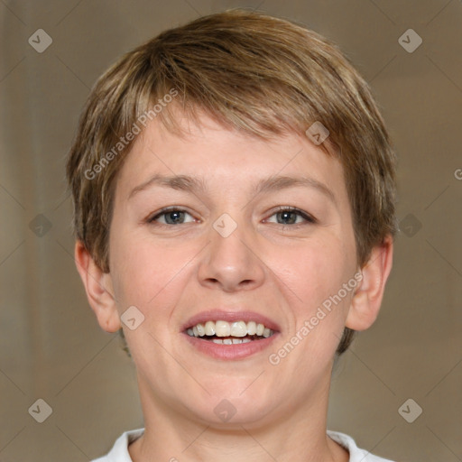 Joyful white adult female with short  brown hair and grey eyes