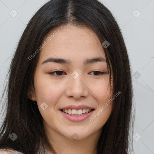 Joyful asian young-adult female with long  brown hair and brown eyes