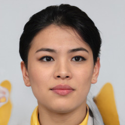 Neutral asian young-adult female with medium  brown hair and brown eyes