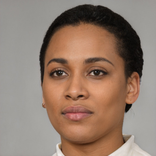 Neutral latino young-adult female with short  black hair and brown eyes