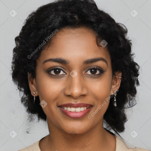 Joyful black young-adult female with long  black hair and brown eyes